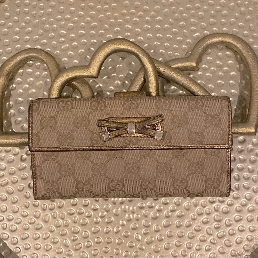 Gucci Gold/Beige GG Canvas and Leather
Princy Continental Wallet